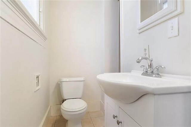 8-10 Neron Pl, New Orleans, LA 70118 - bathroom with tile patterned flooring and vanity