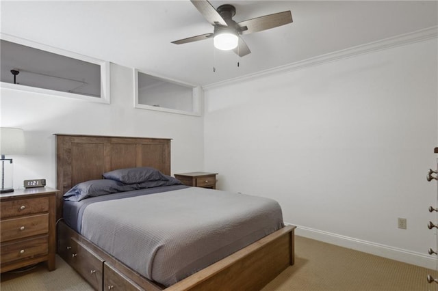 760 Magazine St Unit 113, New Orleans, LA 70130 - bedroom with light carpet, baseboards, and a ceiling fan