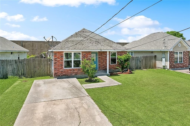 5926 Tullis Dr, New Orleans, LA 70131 - view of front of home featuring brick siding and roof with shingles