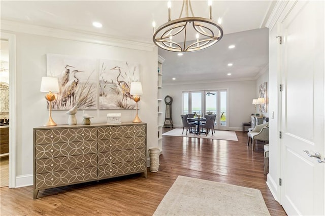 232 Lake Marina Ave Unit 10-D, New Orleans, LA 70124 - foyer featuring ornamental molding, a chandelier, wood finished floors, recessed lighting, and baseboards