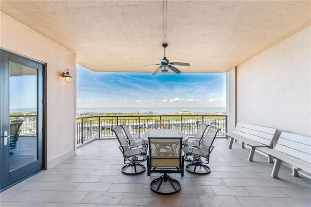 232 Lake Marina Ave Unit 10-D, New Orleans, LA 70124 - view of patio / terrace with a ceiling fan, a balcony, and a water view