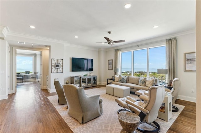 232 Lake Marina Ave Unit 10-D, New Orleans, LA 70124 - living room featuring a ceiling fan, wood finished floors, crown molding, baseboards, and recessed lighting