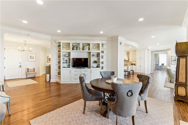 232 Lake Marina Ave Unit 10-D, New Orleans, LA 70124 - dining room featuring ornamental molding, a chandelier, light wood finished floors, recessed lighting, and baseboards