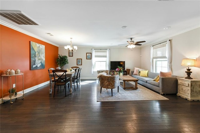 5517 N Rampart St, New Orleans, LA 70117 - living room with ornamental molding, dark wood-type flooring, a chandelier, ceiling fan, and baseboards