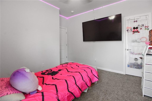 carpeted bedroom with a ceiling fan