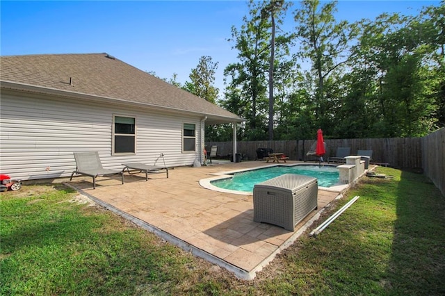 view of swimming pool featuring a patio area