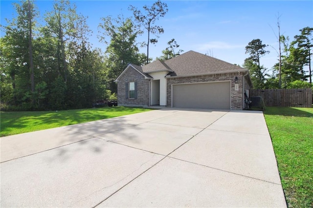 view of front of home with a garage, driveway, roof with shingles, and brick siding