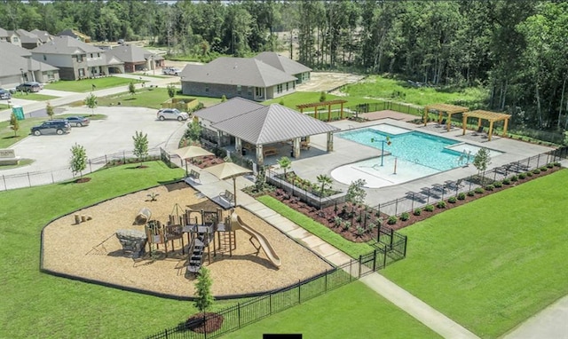 drone / aerial view of a pool