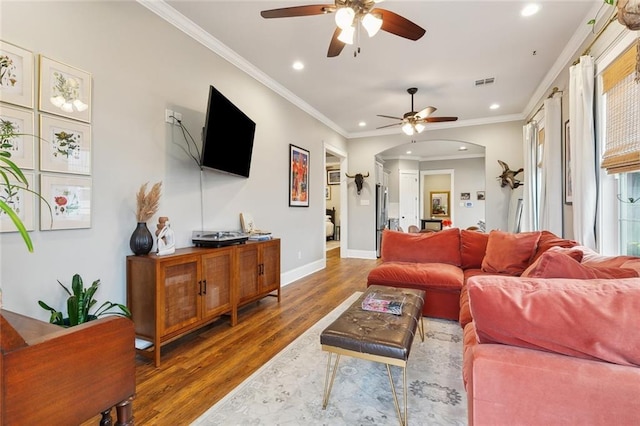 722 Luling Ave, Luling, LA 70070 - living area with a ceiling fan, recessed lighting, arched walkways, wood finished floors, and baseboards