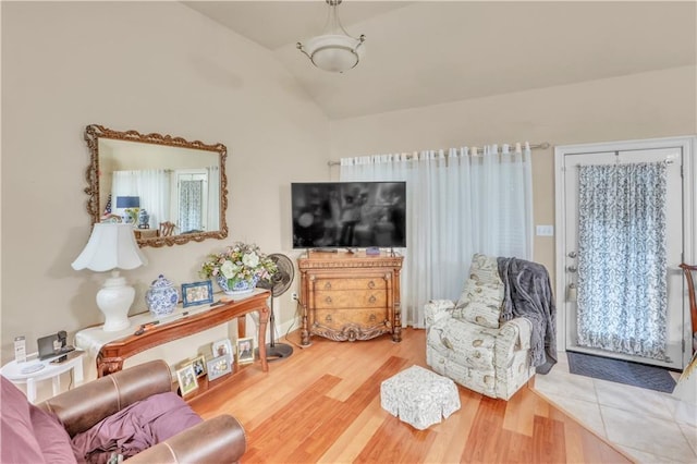 270 Libra Ave Unit B, Mandeville, LA 70471 - living area with vaulted ceiling and wood finished floors