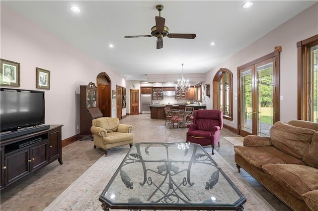 22450 Elderberry Ln, Bush, LA 70431 - living area featuring a ceiling fan, a chandelier, baseboards, recessed lighting, and arched walkways
