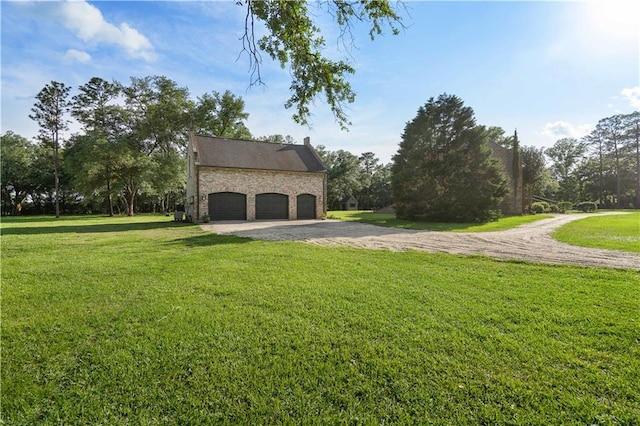 22450 Elderberry Ln, Bush, LA 70431 - view of property exterior featuring a lawn, a garage, and gravel driveway