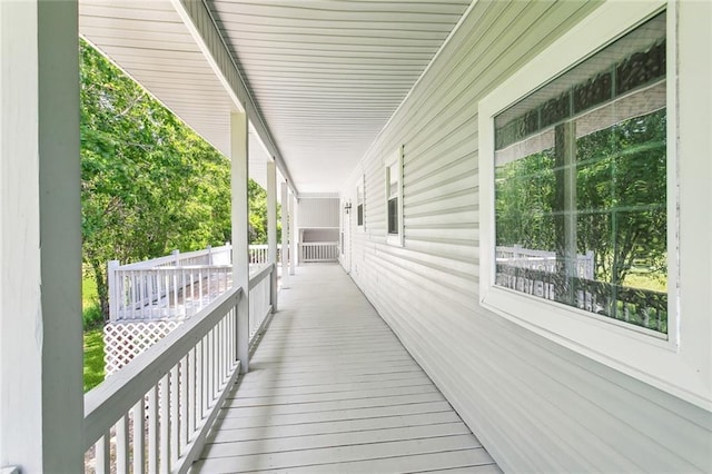 wooden terrace with covered porch