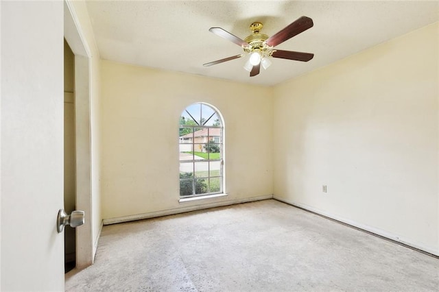 114 Pitre St, Saint Rose, LA 70087 - spare room featuring ceiling fan and unfinished concrete flooring