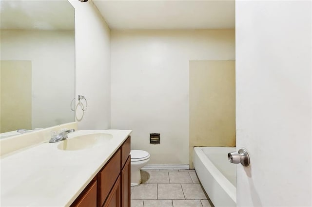 114 Pitre St, Saint Rose, LA 70087 - full bathroom featuring tile patterned flooring, toilet, vanity, and a tub