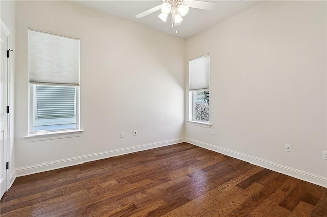 993 Beauregard Pkwy, Covington, LA 70433 - spare room with wood finished floors, a ceiling fan, and baseboards