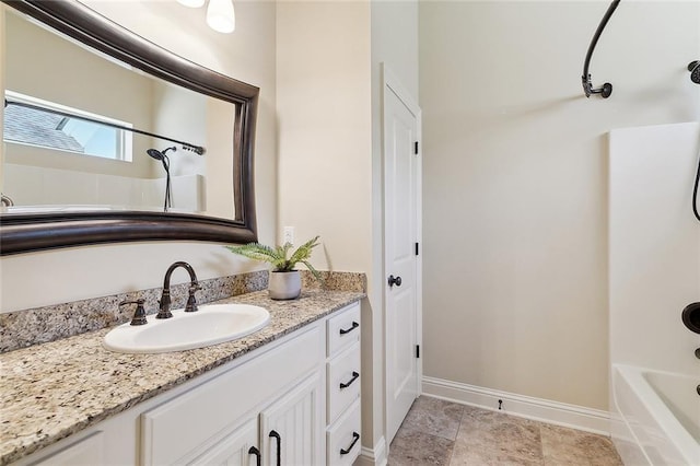 993 Beauregard Pkwy, Covington, LA 70433 - full bathroom featuring baseboards, vanity, and shower / tub combination