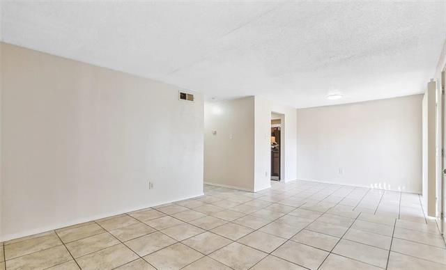 917 W Monterey Ct, Terrytown, LA 70056 - empty room featuring light tile patterned flooring