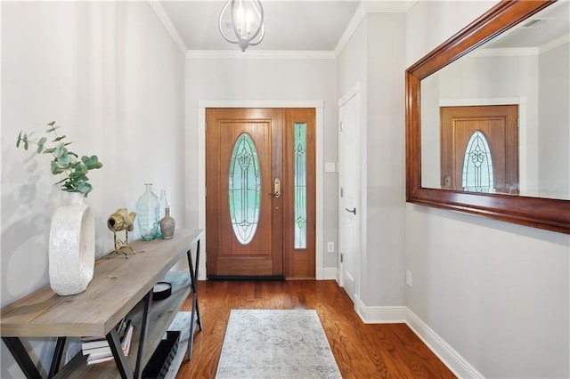 26 Camellia Dr, Covington, LA 70433 - entryway with wood finished floors, baseboards, and crown molding