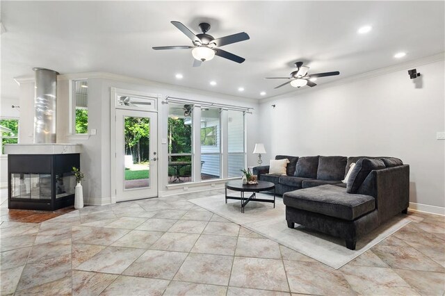 26 Camellia Dr, Covington, LA 70433 - living area with crown molding, a ceiling fan, recessed lighting, and baseboards