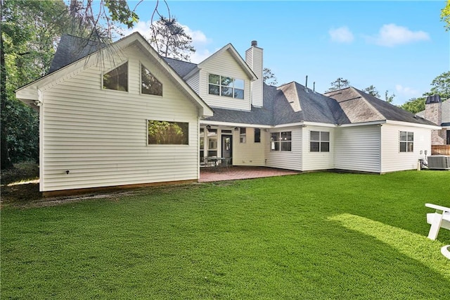 26 Camellia Dr, Covington, LA 70433 - rear view of house featuring central AC, a chimney, a patio, and a yard