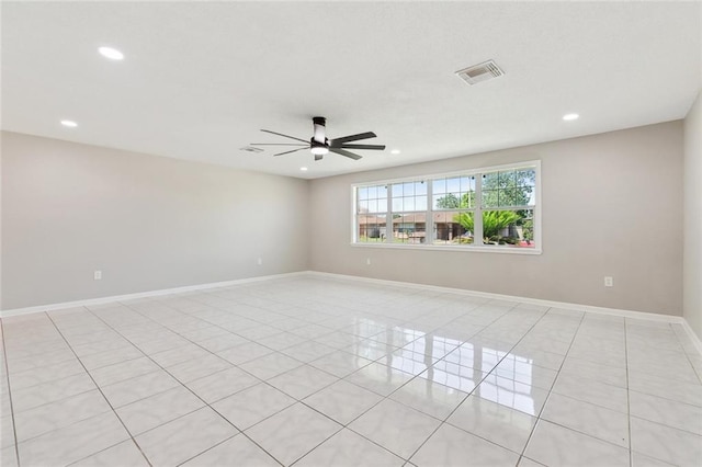 7511 Fieldston Rd, New Orleans, LA 70126 - spare room featuring light tile patterned floors, ceiling fan, recessed lighting, and baseboards
