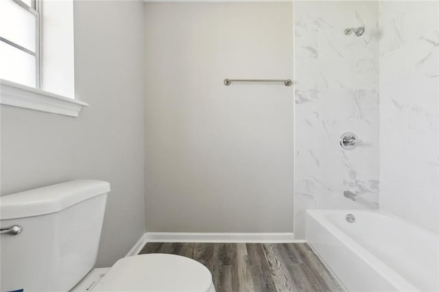 7511 Fieldston Rd, New Orleans, LA 70126 - full bathroom with toilet, wood finished floors, and baseboards