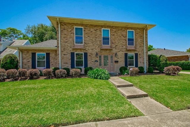 5831 Durbridge Dr, New Orleans, LA 70131 - view of front facade with a front yard and brick siding