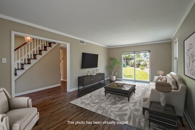 5831 Durbridge Dr, New Orleans, LA 70131 - living area with stairs, wood finished floors, baseboards, ornamental molding, and a chandelier