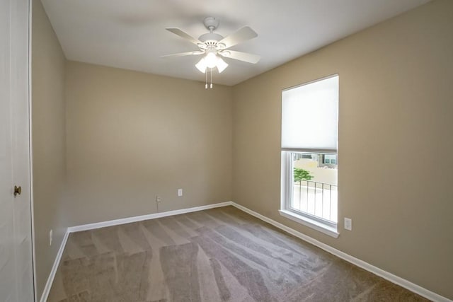 5831 Durbridge Dr, New Orleans, LA 70131 - carpeted spare room with baseboards and a ceiling fan