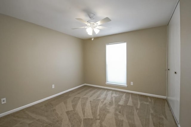 5831 Durbridge Dr, New Orleans, LA 70131 - spare room featuring baseboards, a ceiling fan, and light carpet