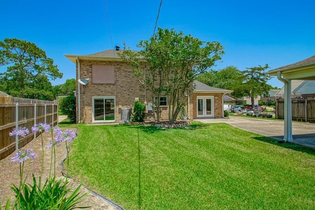 5831 Durbridge Dr, New Orleans, LA 70131 - back of house with french doors and brick siding