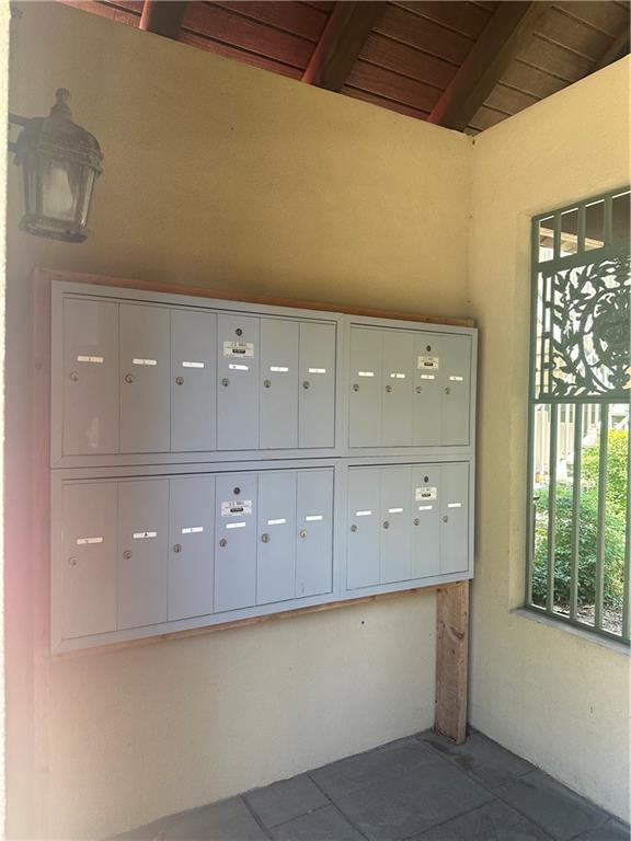 3725 Marion St Unit 5, Metairie, LA 70002 - view of exterior entry featuring stucco siding