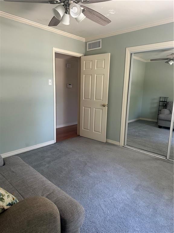 3725 Marion St Unit 5, Metairie, LA 70002 - unfurnished bedroom featuring ornamental molding, carpet, baseboards, a closet, and ceiling fan