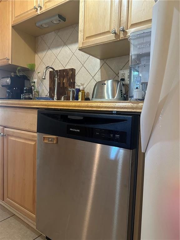 3725 Marion St Unit 5, Metairie, LA 70002 - kitchen with dishwasher, decorative backsplash, light brown cabinetry, and light countertops