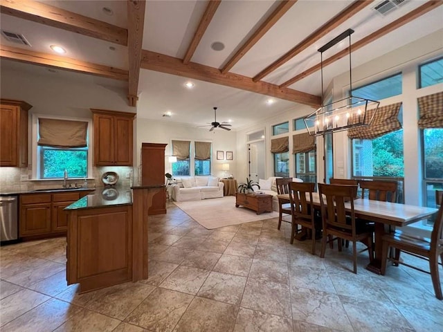 7 Spanish Moss Ct, Mandeville, LA 70471 - dining room featuring plenty of natural light, a ceiling fan, beam ceiling, a chandelier, and recessed lighting