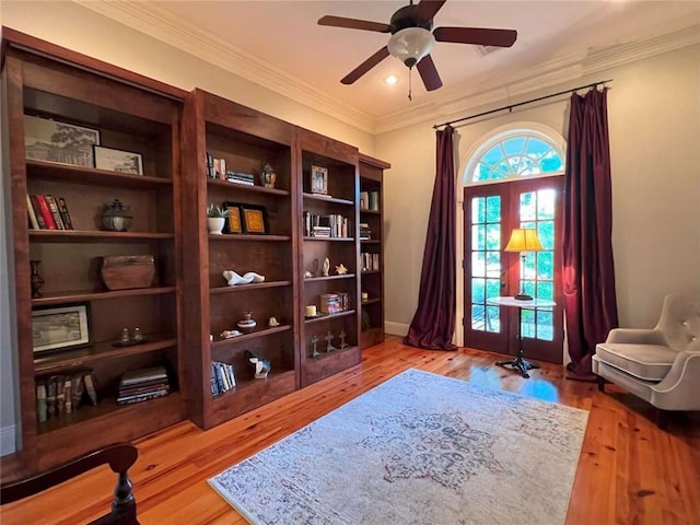 7 Spanish Moss Ct, Mandeville, LA 70471 - sitting room with a ceiling fan, wood finished floors, crown molding, and baseboards