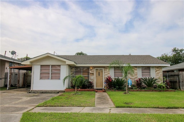 1620 Maplewood Dr, Harvey, LA 70058 - ranch-style house featuring concrete driveway, a carport, and brick siding