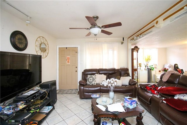 1620 Maplewood Dr, Harvey, LA 70058 - living room featuring a ceiling fan and light tile patterned flooring