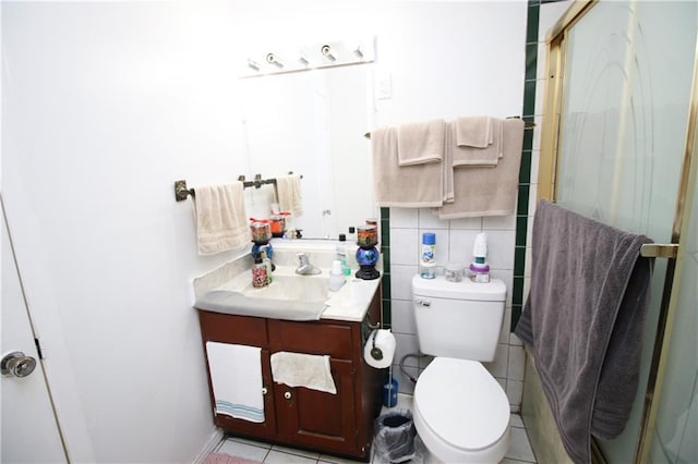 1620 Maplewood Dr, Harvey, LA 70058 - bathroom featuring a stall shower, vanity, toilet, and tile patterned floors