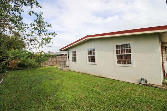 1620 Maplewood Dr, Harvey, LA 70058 - view of home's exterior featuring stucco siding and central AC