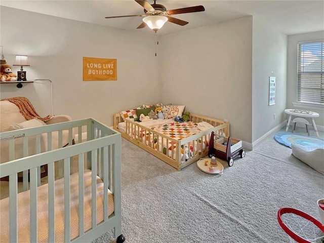 629 High Ridge Loop, Slidell, LA 70458 - bedroom with carpet flooring, baseboards, and ceiling fan