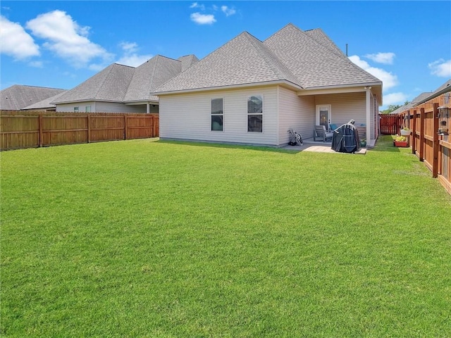 629 High Ridge Loop, Slidell, LA 70458 - back of house featuring roof with shingles and a patio area