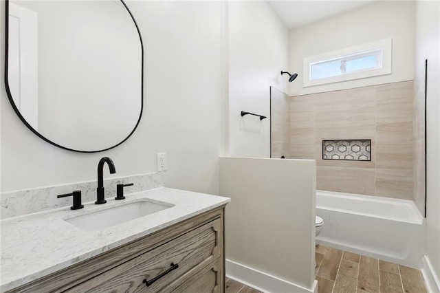 5128 Cunningham Ct, New Orleans, LA 70126 - full bath featuring toilet, vanity, wood finished floors, and bathtub / shower combination