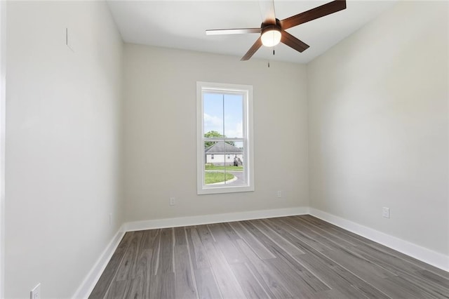 5128 Cunningham Ct, New Orleans, LA 70126 - empty room with wood finished floors, ceiling fan, and baseboards