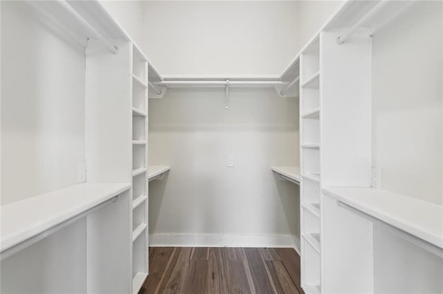 5128 Cunningham Ct, New Orleans, LA 70126 - spacious closet featuring dark wood-style flooring