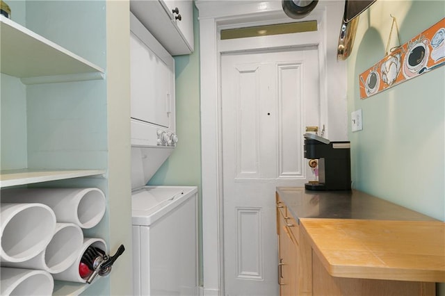 627 Ursulines Ave Unit 9, New Orleans, LA 70116 - clothes washing area featuring stacked washer / drying machine