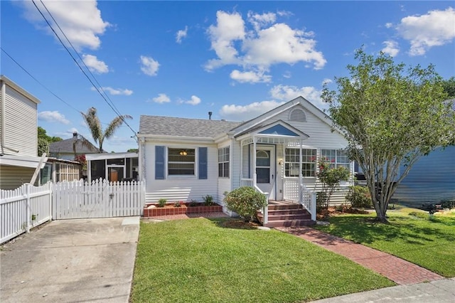 4 Virginia Ct, New Orleans, LA 70124 - view of front of property featuring roof with shingles and a sunroom