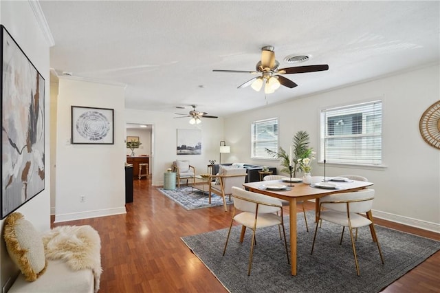 4 Virginia Ct, New Orleans, LA 70124 - dining space featuring wood finished floors, ceiling fan, baseboards, and ornamental molding