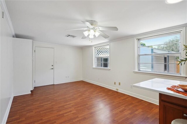 4 Virginia Ct, New Orleans, LA 70124 - spare room featuring wood finished floors, baseboards, ceiling fan, and crown molding